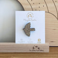Broche oiseau doré